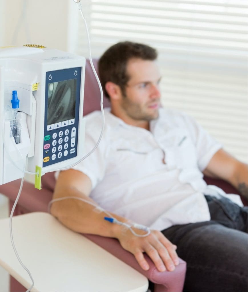 Man receiving IV therapy