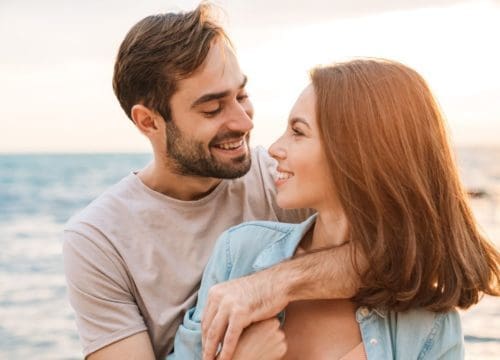 Happy man with girlfriend after PRP for hair loss treatments